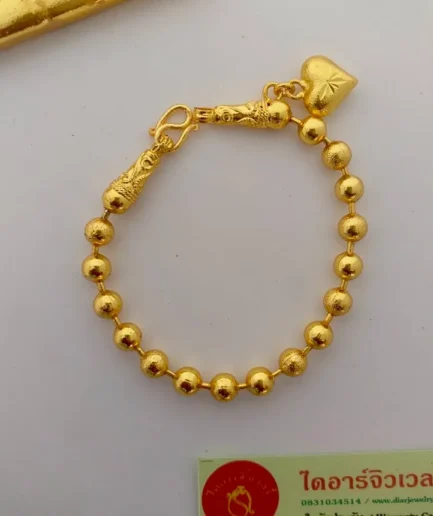 สร้อยข้อมือทองชุบ 1 บาท ลายไข่ปลาสลับ พร้อมจี้หัวใจ